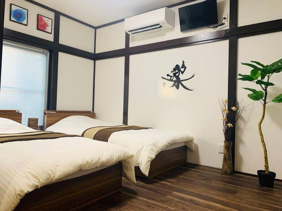 東京民泊 貸し切り一軒家 モダン和風 畳 青砥 上野 プライベート空間 最大8名 Apartemen *